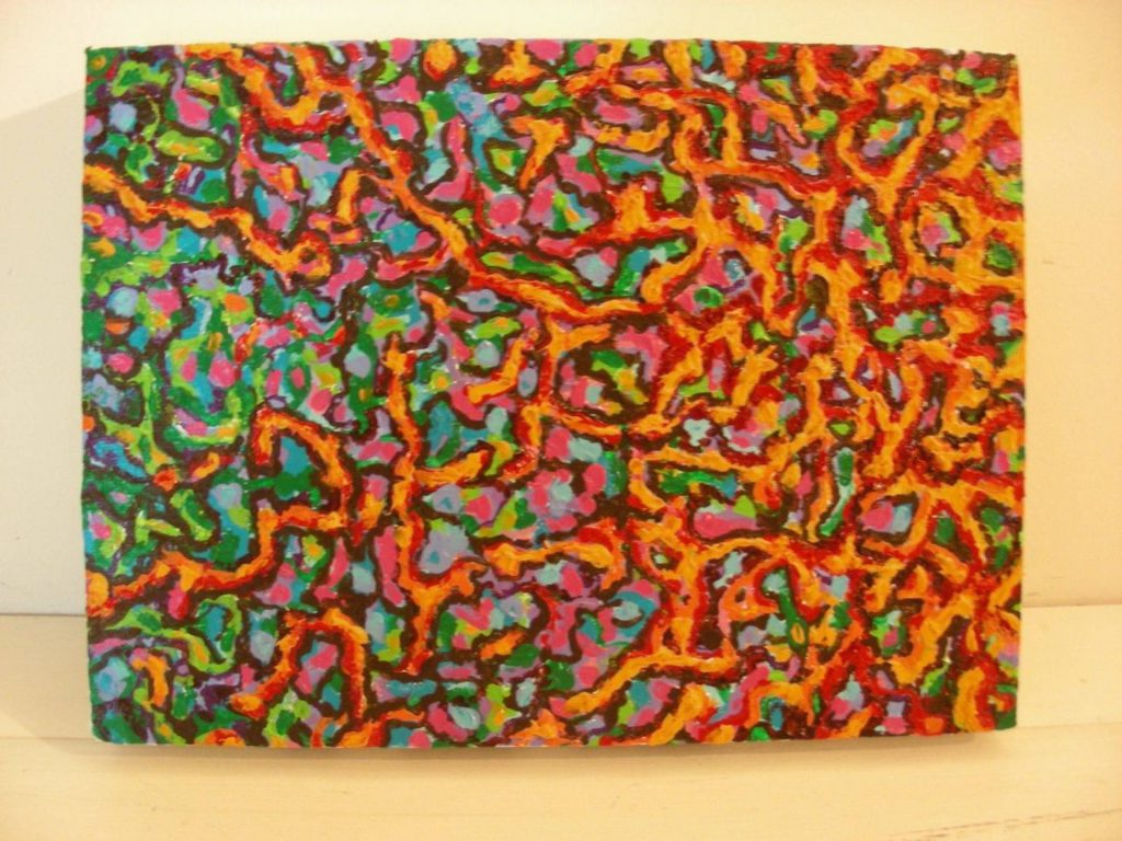 a colorful painting on a wall